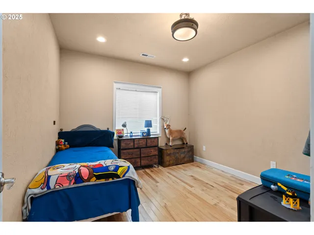 a room with furniture and a flat screen tv