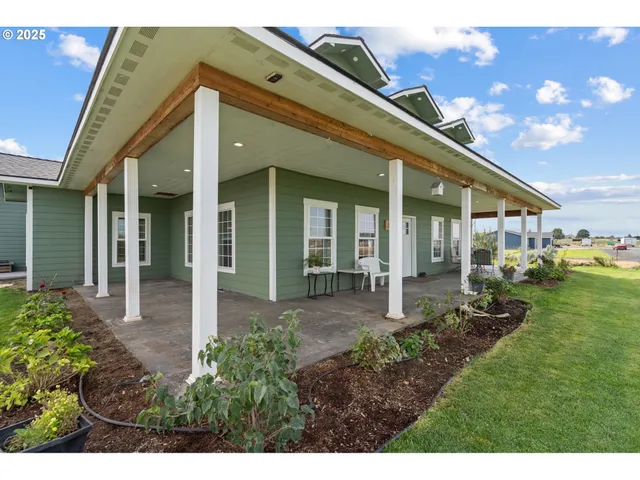 a view of a house with garden