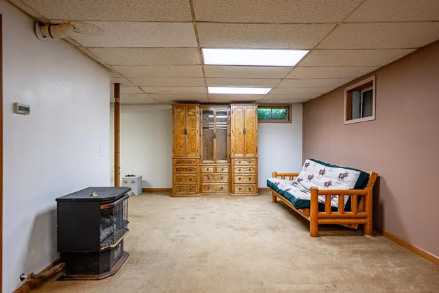 a room with furniture and gym equipment