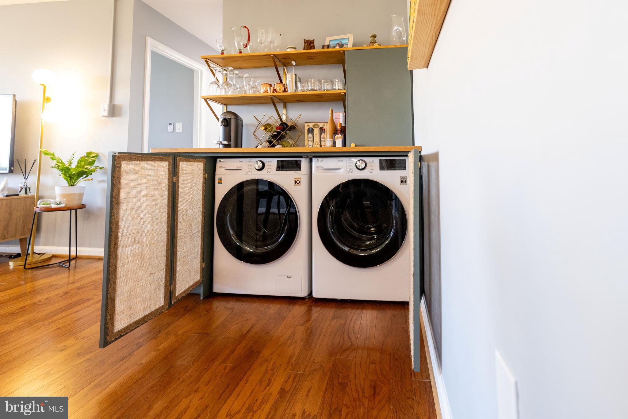 8830 Piney Branch Road, Unit 1207 Silver Spring, MD 20903 - Photo 31 of 38 a utility room with dryer and washer