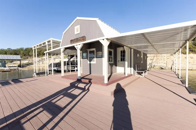 a balcony with wooden floor