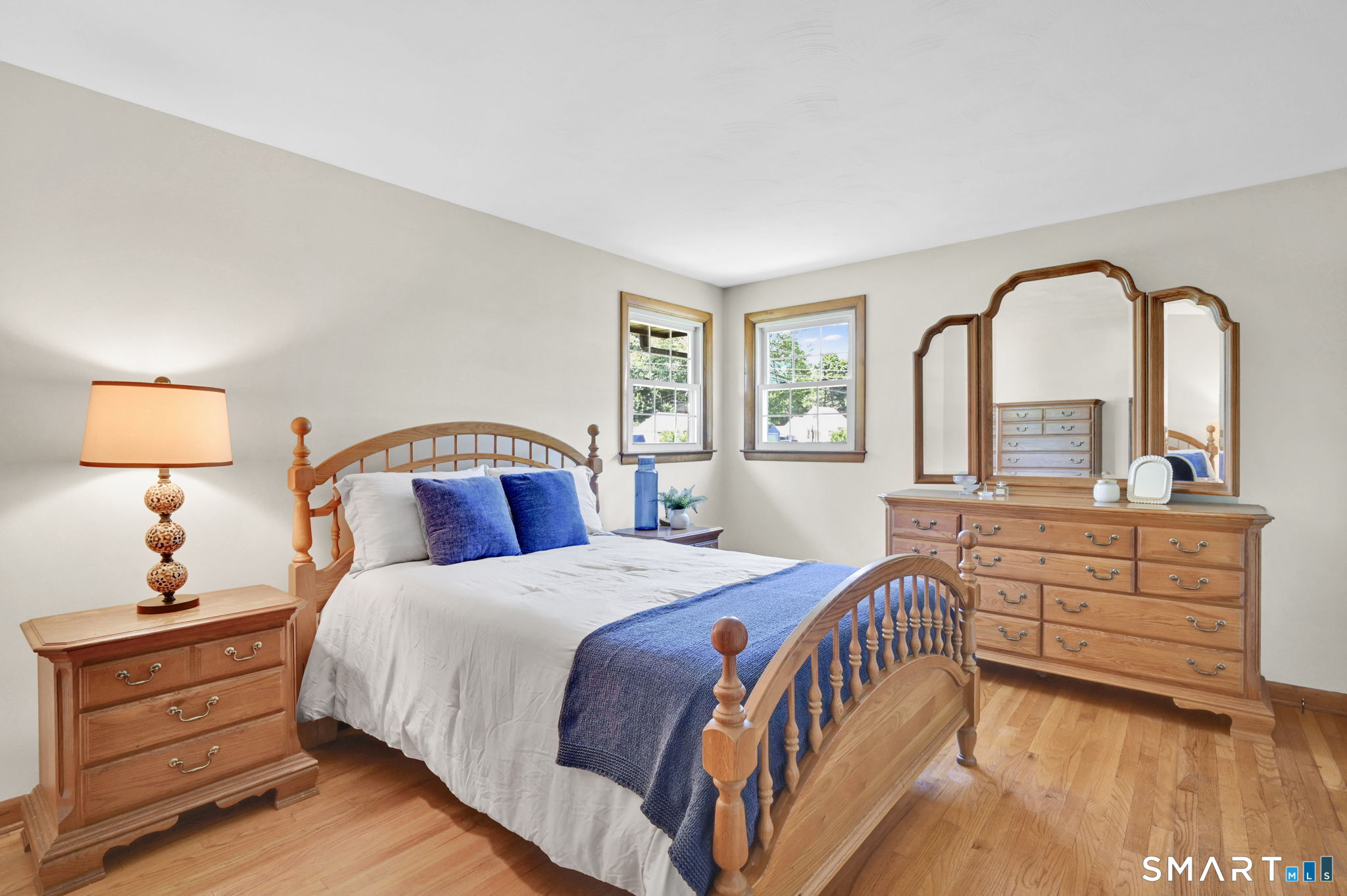 296 Phoenix Street Vernon, CT 06066 - Photo 12 of 34 a bed room with a bed and a large window