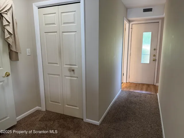 wooden floor with cabinet
