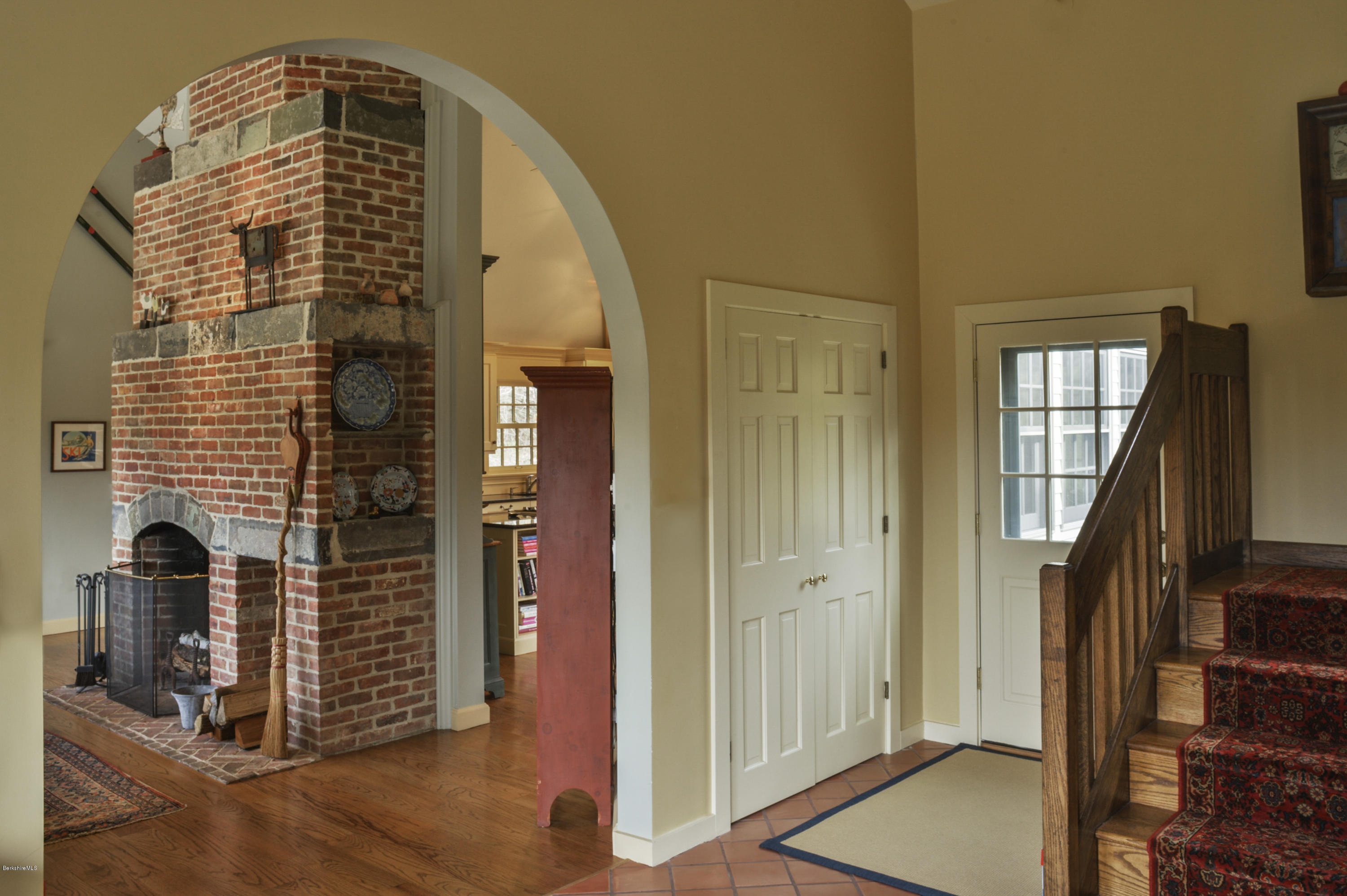 22 Tyringham Road Monterey, MA 01245 - Photo 11 of 24 a view of a hallway with wooden floor and staircase