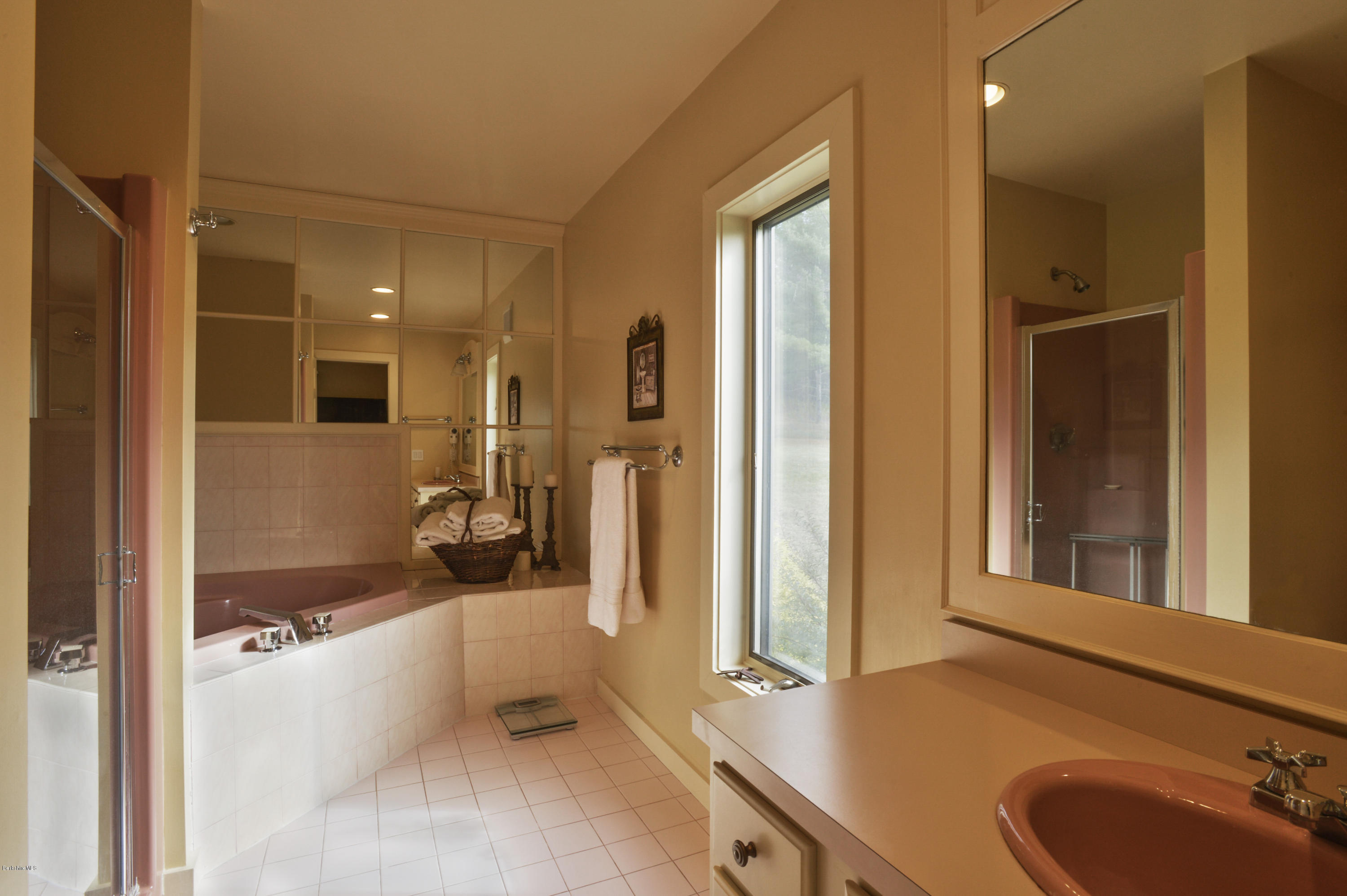 22 Tyringham Road Monterey, MA 01245 - Photo 16 of 24 a bathroom with a tub a sink and mirror