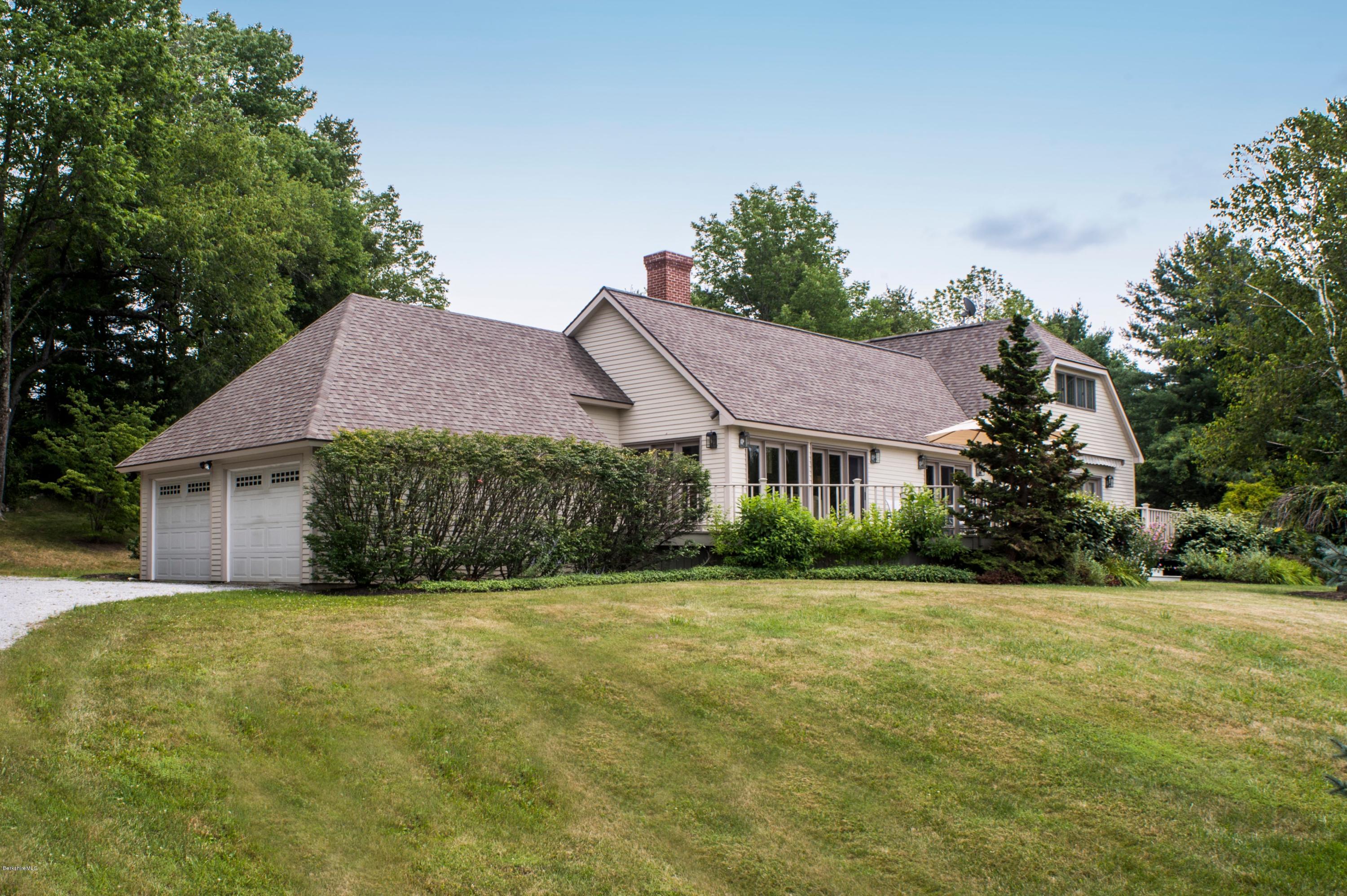 22 Tyringham Road Monterey, MA 01245 - Photo 22 of 24 a view of a house with a yard and potted plants