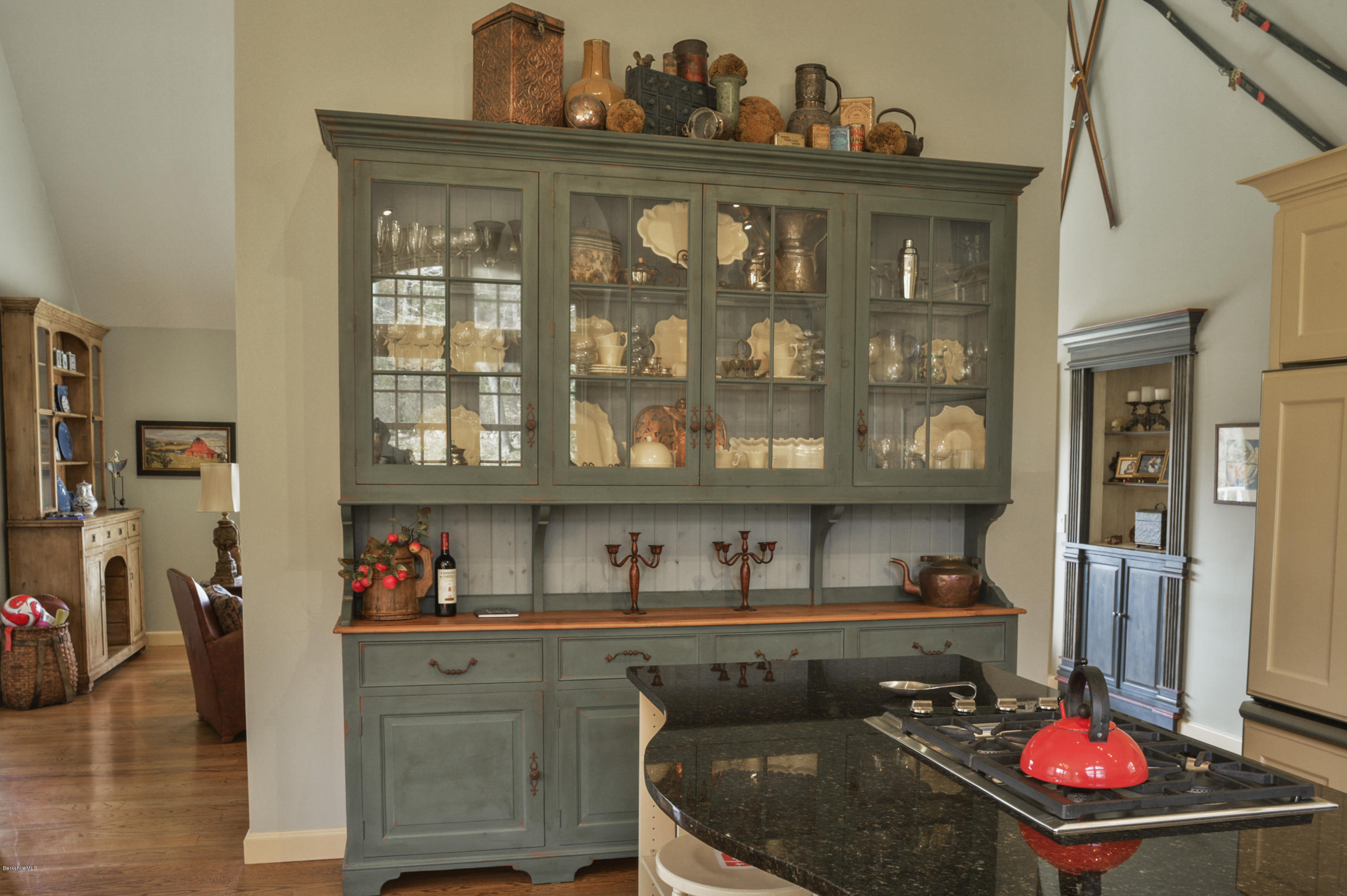 22 Tyringham Road Monterey, MA 01245 - Photo 9 of 24 a kitchen with a sink a stove and a wooden floor
