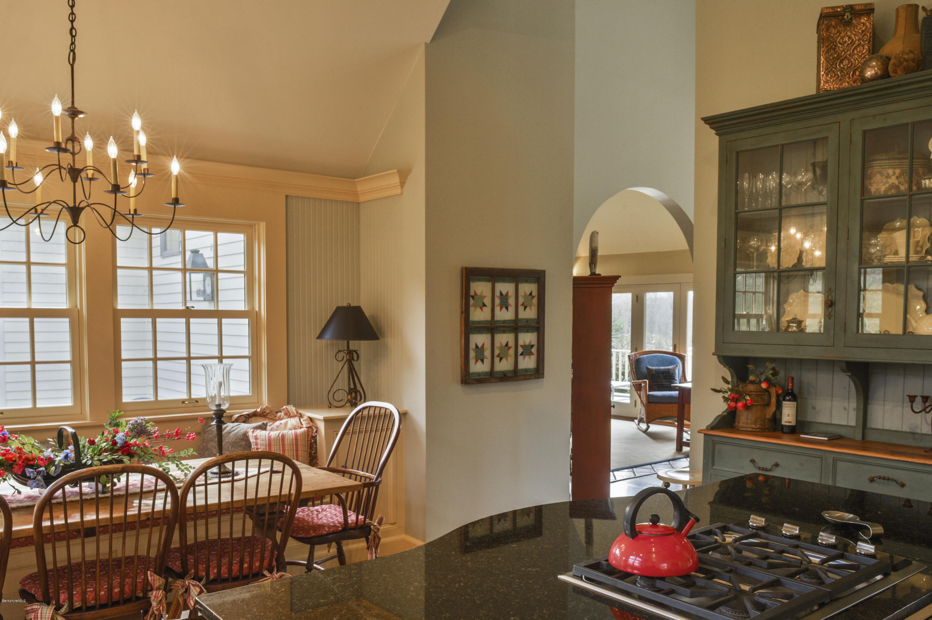 22 Tyringham Road Monterey, MA 01245 - Photo 10 of 24 a living room with furniture a chandelier and a window