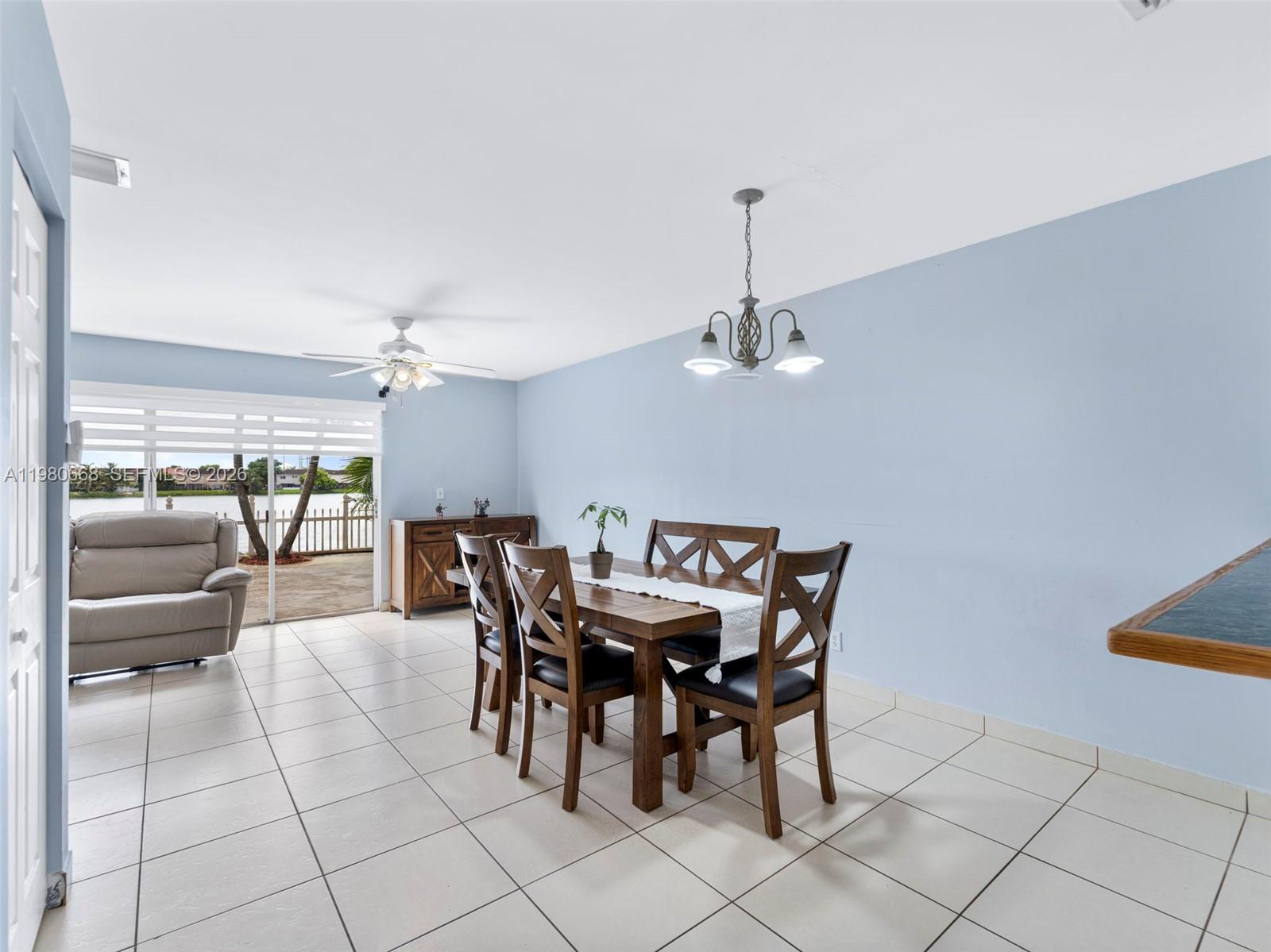 17337 Southwest 140th Court Miami, FL 33177 - Photo 19 of 41 a view of a dining room with furniture