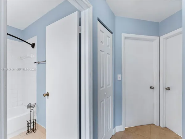 a view of a bedroom from the hallway