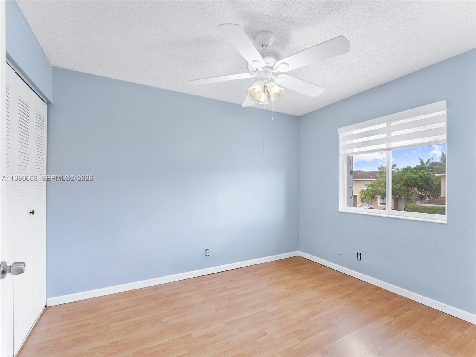 17337 Southwest 140th Court Miami, FL 33177 - Photo 27 of 41 a view of an empty room with a window
