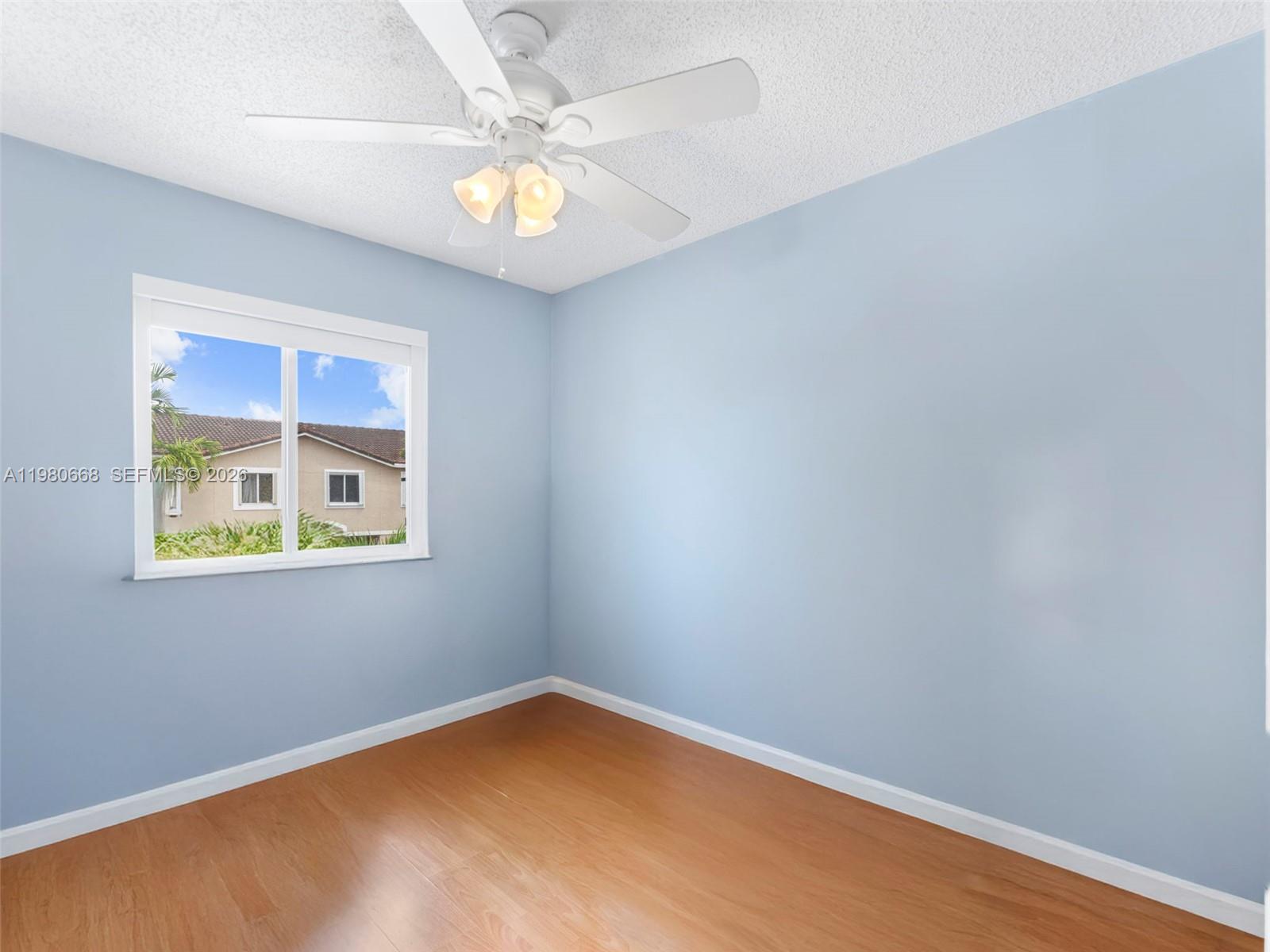 17337 Southwest 140th Court Miami, FL 33177 - Photo 28 of 41 an empty room with a window