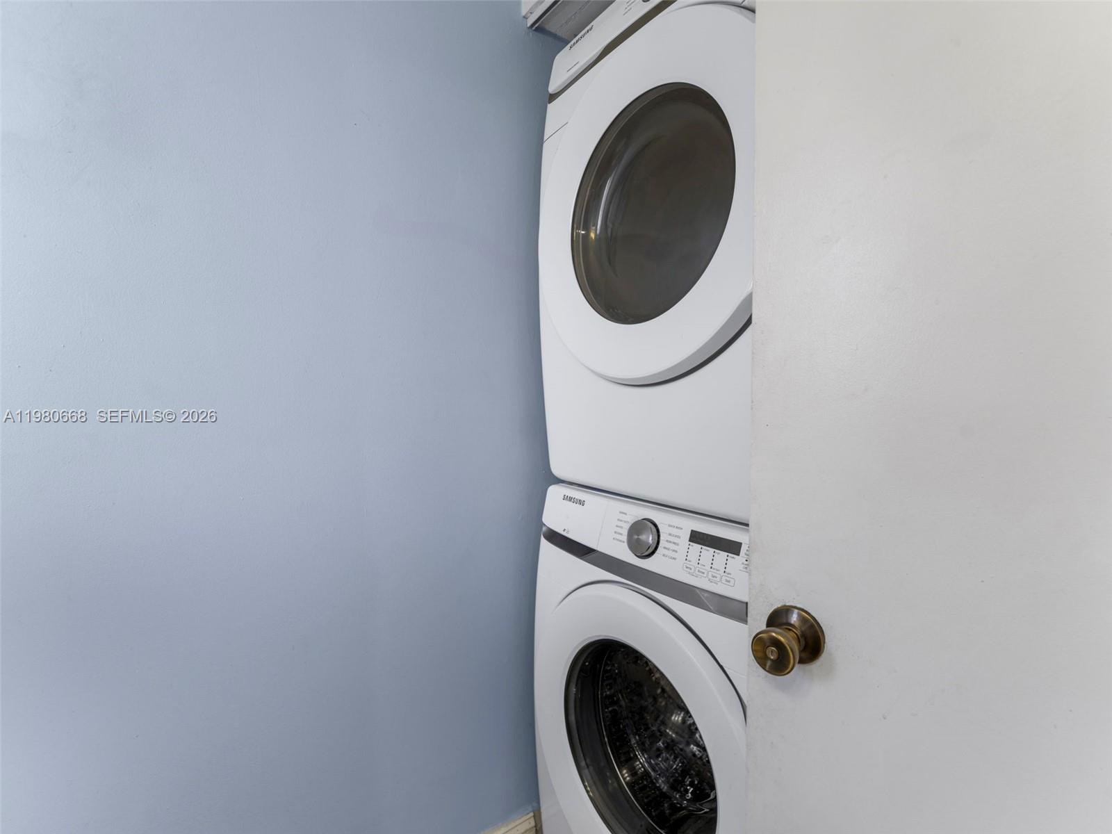 17337 Southwest 140th Court Miami, FL 33177 - Photo 7 of 41 a close up view of a washer and dryer