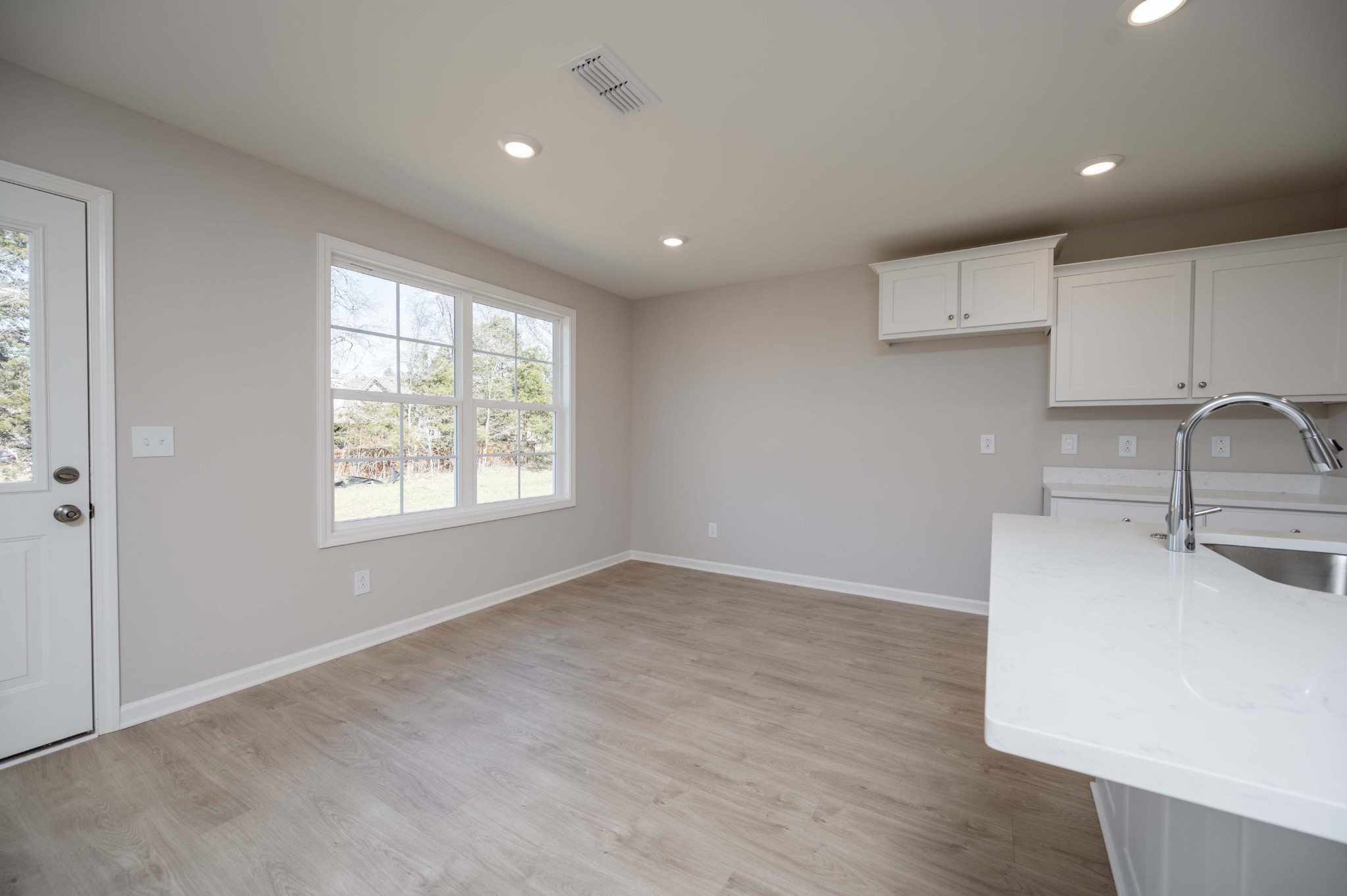 1313 Lakewalk Drive Antioch, TN 37013 - Photo 14 of 28 a kitchen with stainless steel appliances a sink stove and cabinets