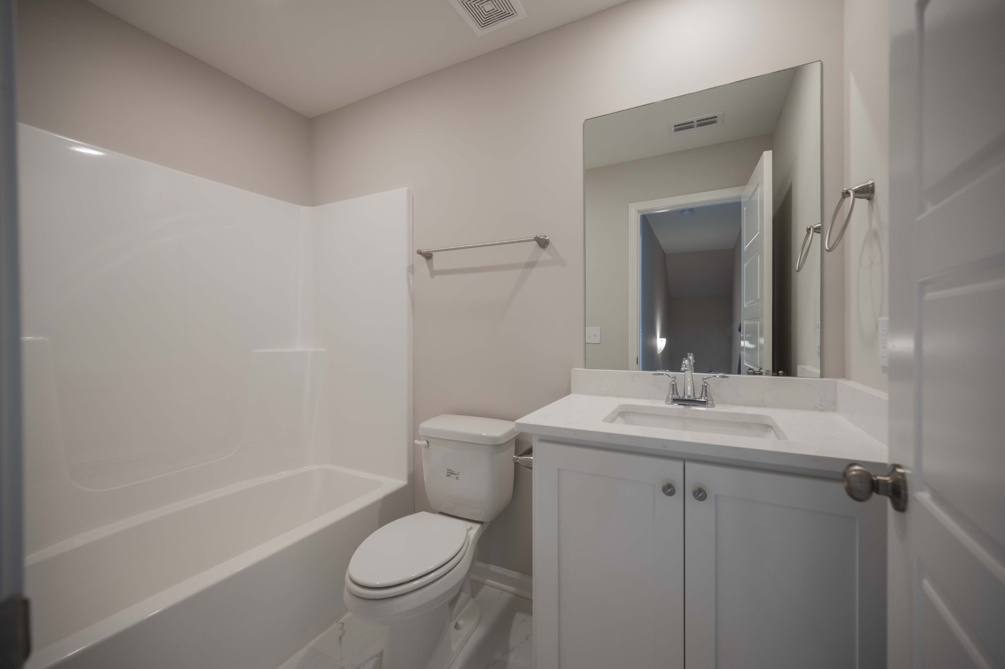 1313 Lakewalk Drive Antioch, TN 37013 - Photo 25 of 28 a bathroom with a sink a toilet and shower