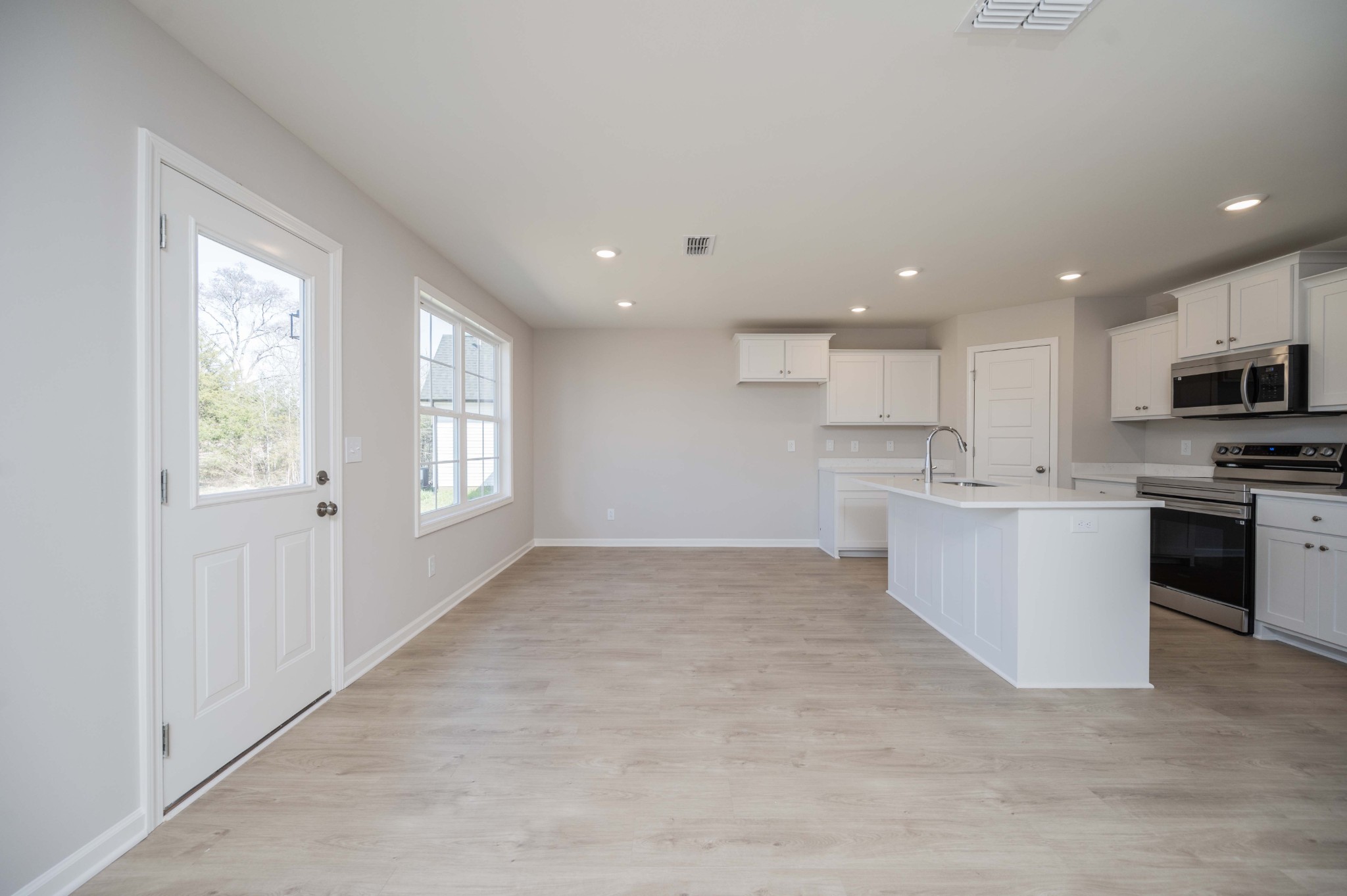 1313 Lakewalk Drive Antioch, TN 37013 - Photo 6 of 28 a view of kitchen with wooden floor and electronic appliances