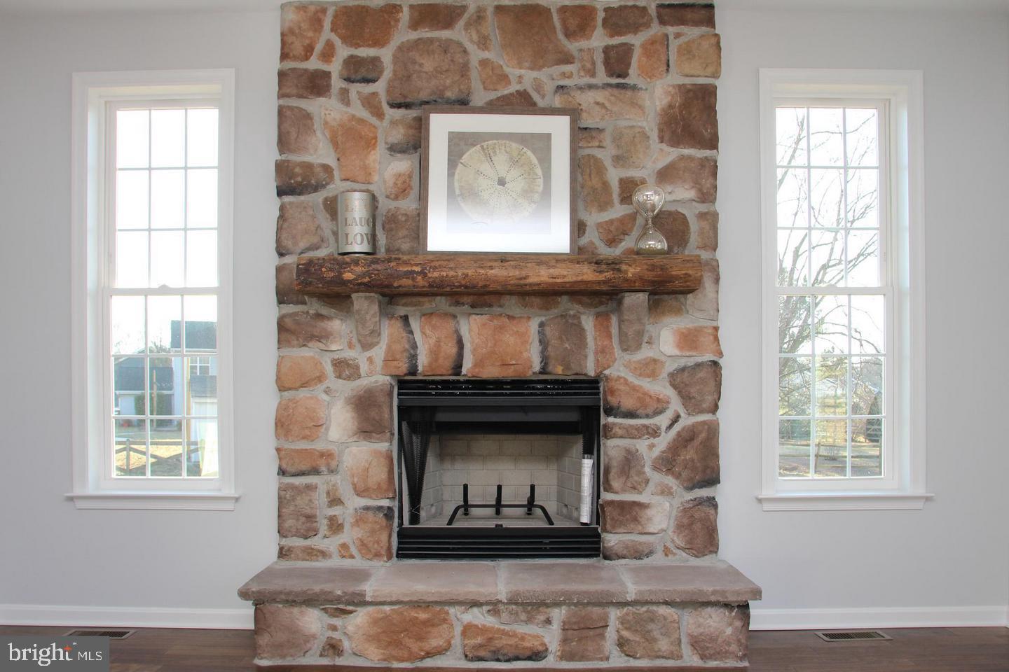601 Irwin Road Bel Air, MD 21014 - Photo 10 of 27 Family room stone hearth fireplace