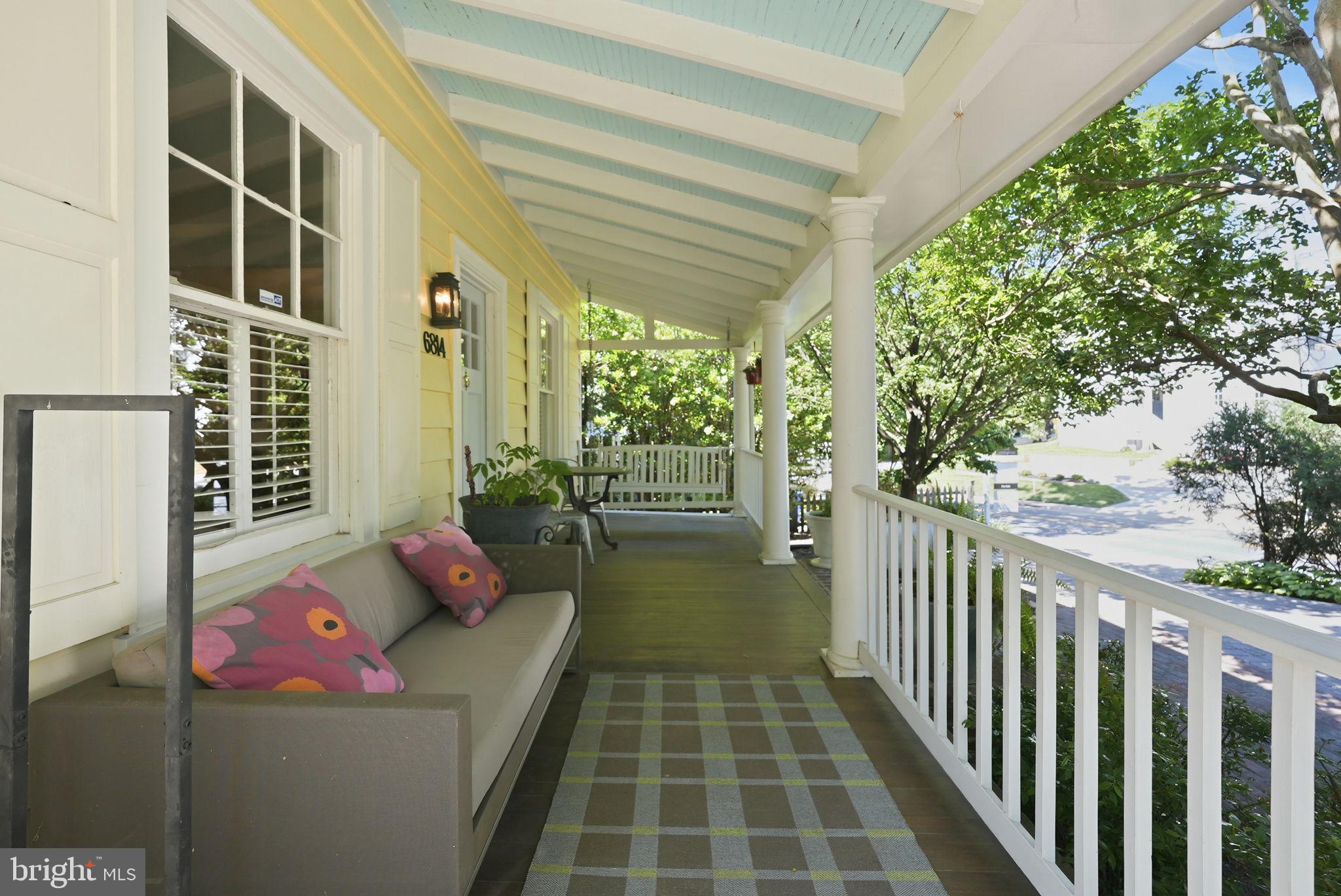 6814 Brookville Road Chevy Chase, MD 20815 - Photo 3 of 39 Charming porch with vibrant accents.