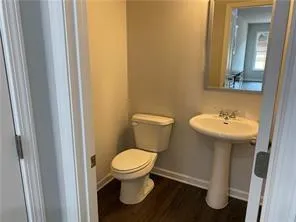 a bathroom with a sink and a toilet