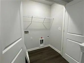 a view of storage and utility room with empty racks