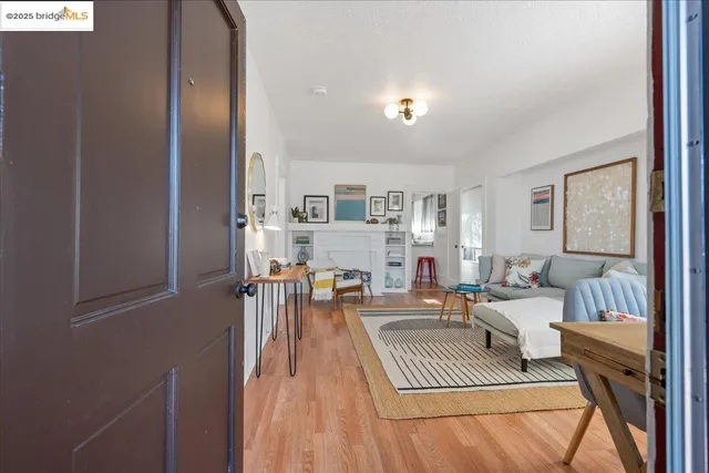 a living room with furniture and a table