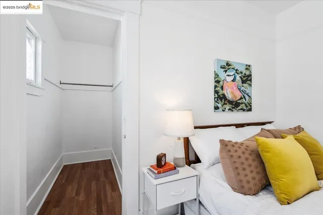 a bed room with a bed and a window