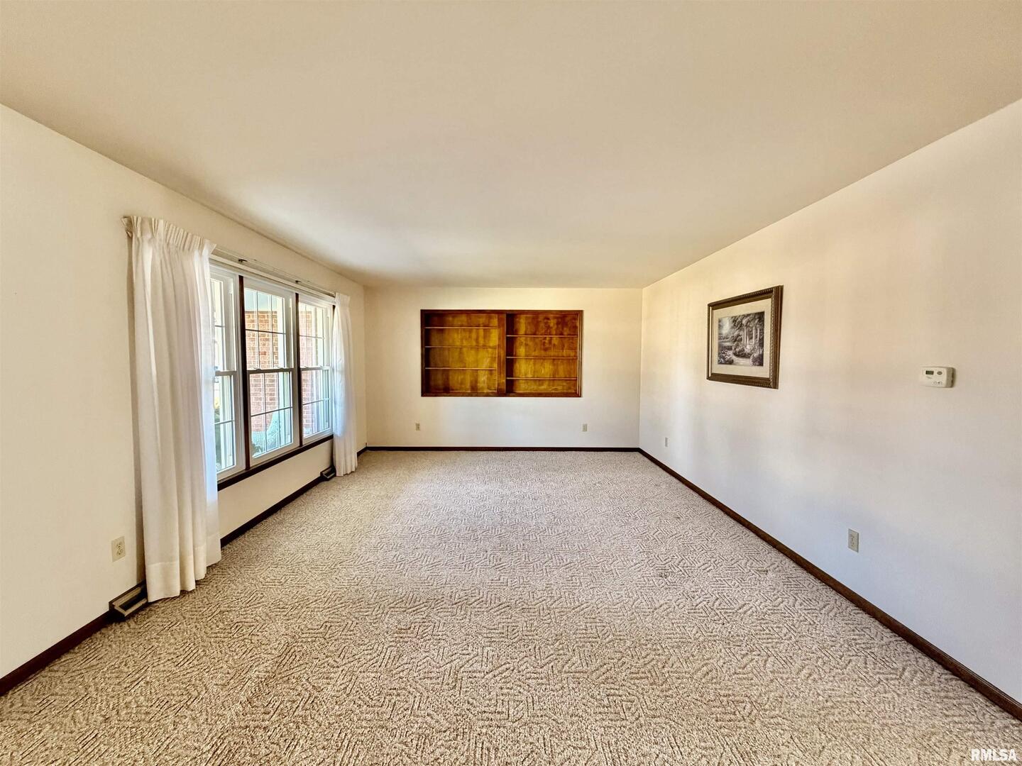 540 Meadowbrook Lane Centralia, IL 62801 - Photo 2 of 14 a view of an empty room with a window