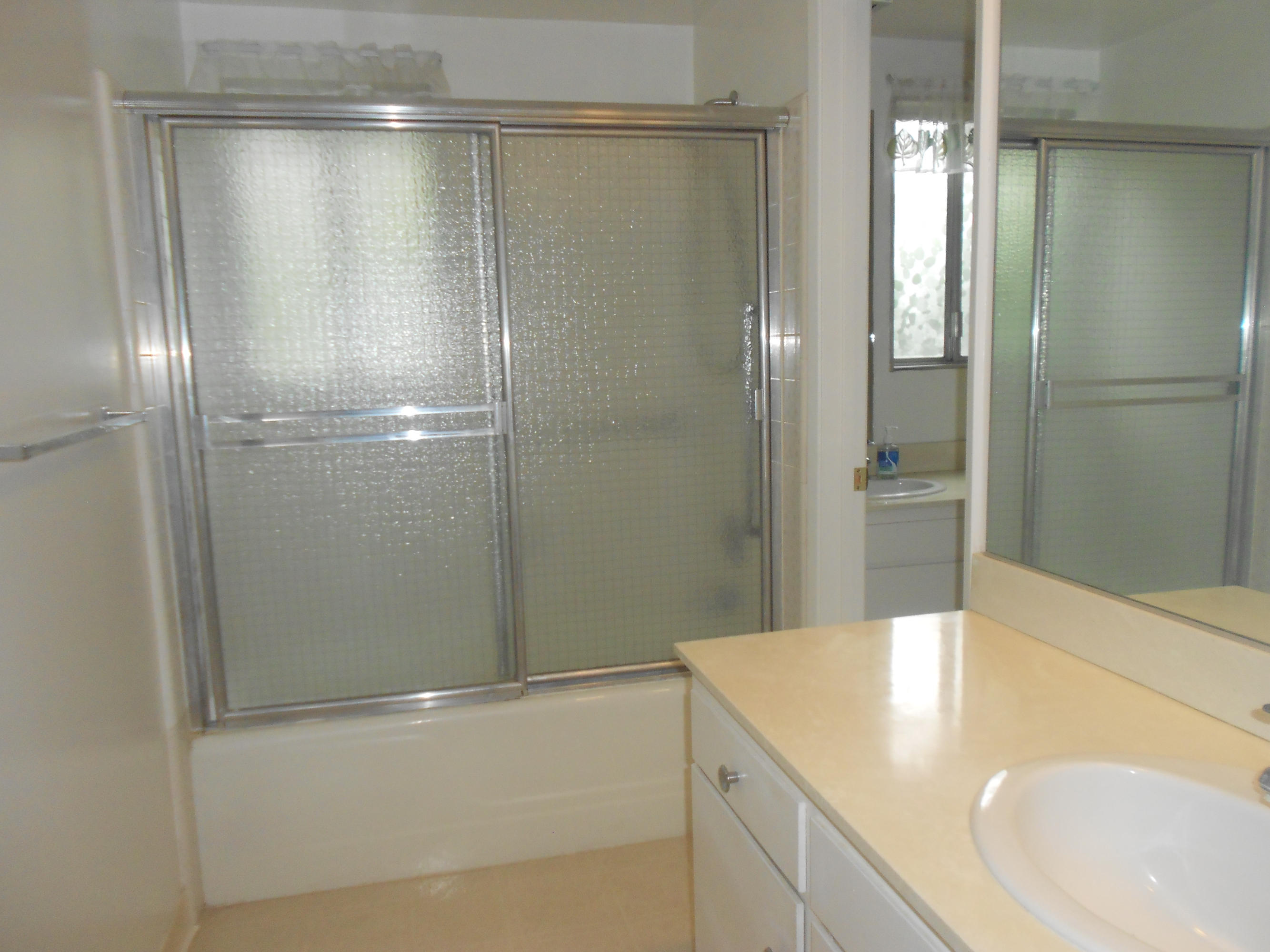5740 Encina Road, Unit 1 Goleta, CA 93117 - Photo 6 of 9 a bathroom with a sink and shower