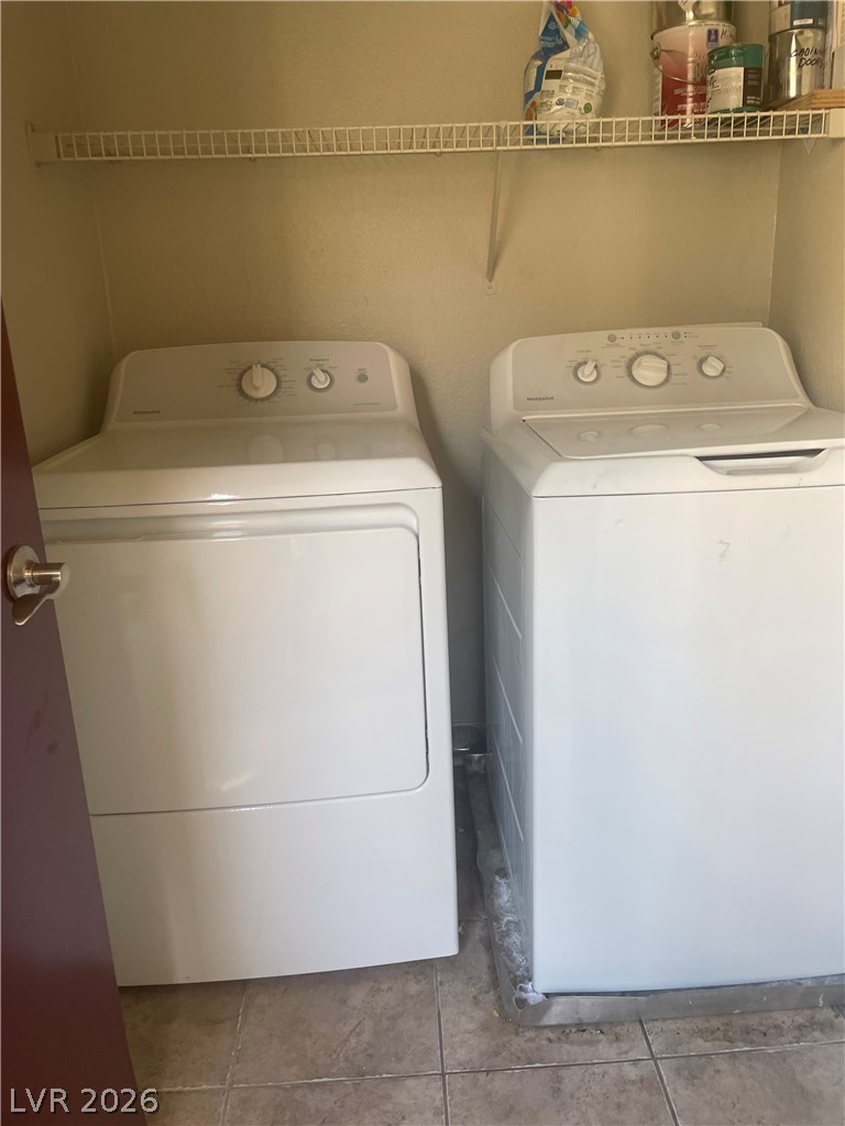 9325 West Desert Inn Road, Unit 278 Las Vegas, NV 89117 - Photo 11 of 17 A dedicated laundry space provides practical, accessible convenience for household chores.