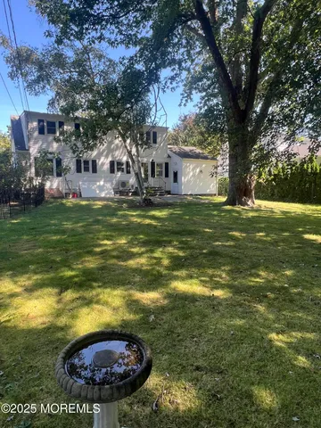 a view of a house with a big yard