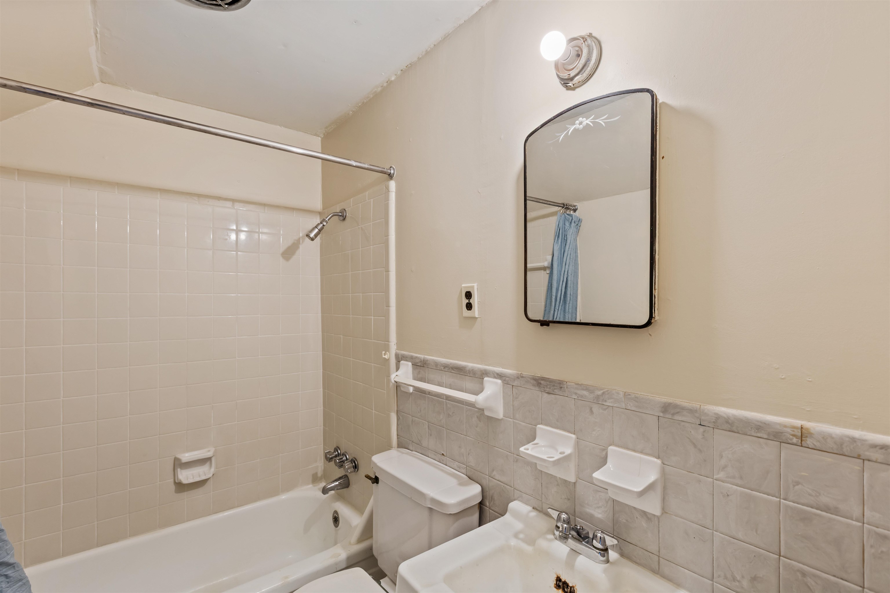125 Keough Road Collierville, TN 38017 - Photo 13 of 19 a bathroom with a toilet sink and mirror