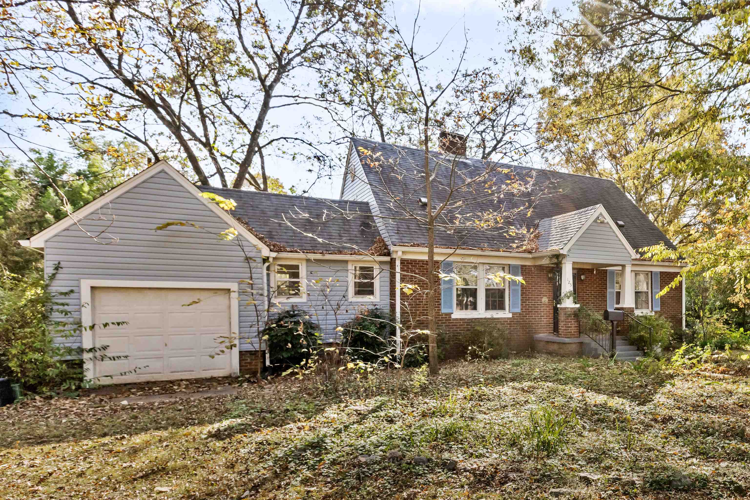 125 Keough Road Collierville, TN 38017 - Photo 2 of 19 front view of a house with a yard