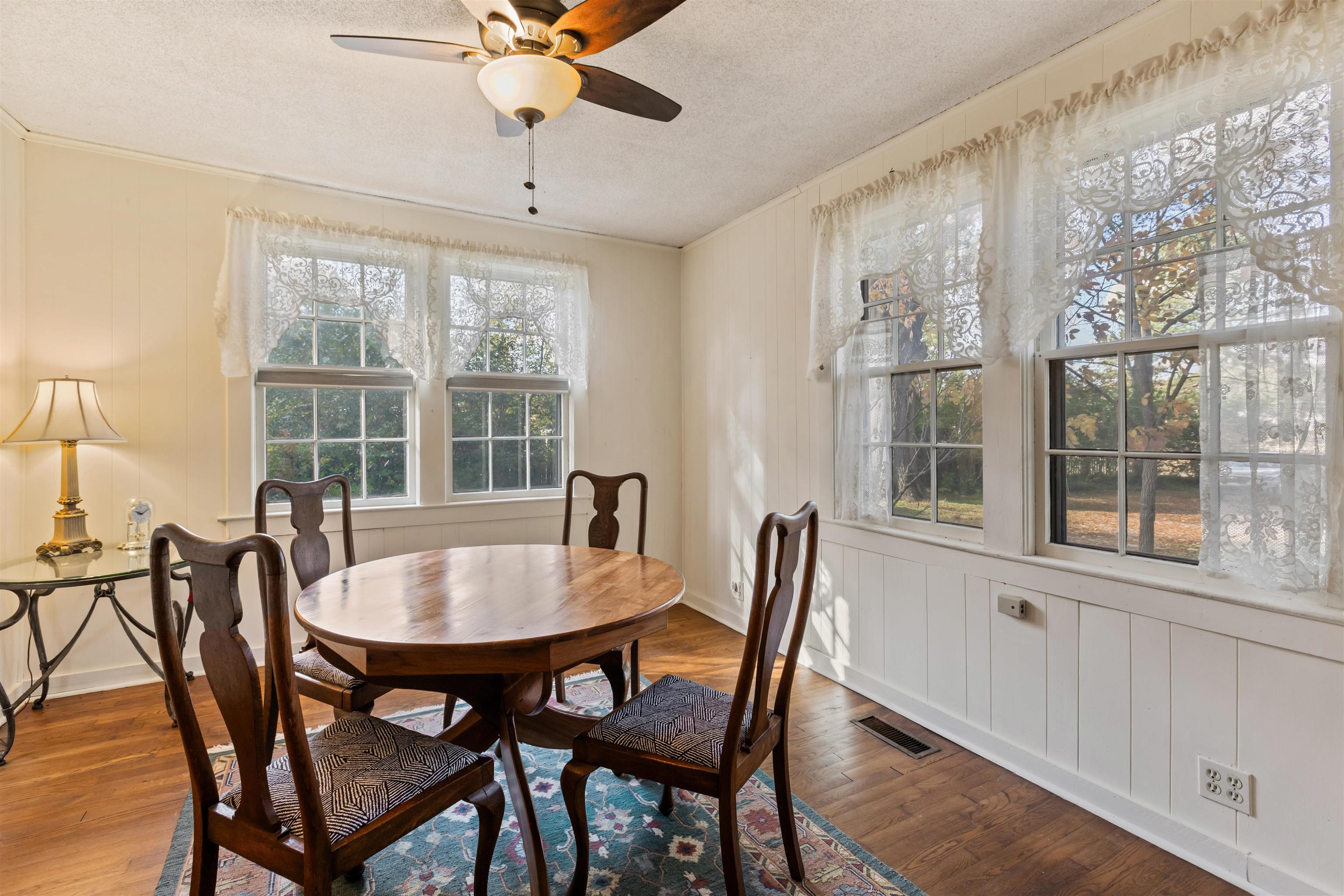 125 Keough Road Collierville, TN 38017 - Photo 5 of 19 a dining room with furniture window and wooden floor