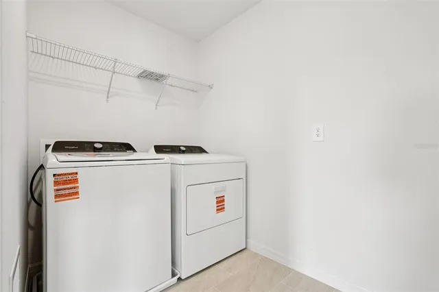 a view of an house with backyard space and porch