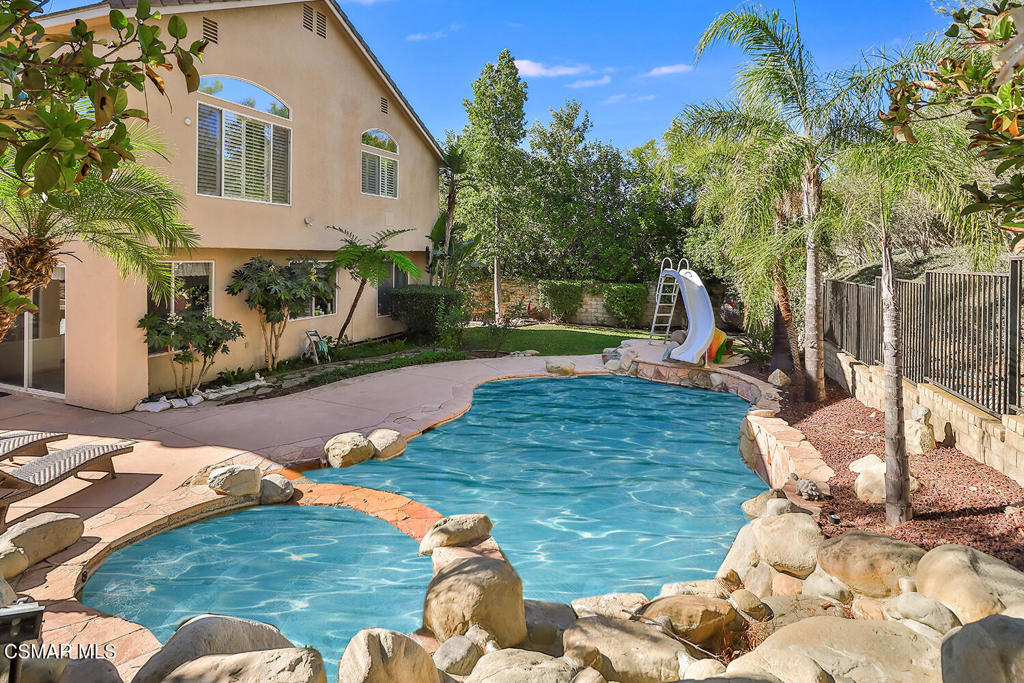 6291 Deerbrook Road Oak Park, CA 91377 - Photo 29 of 29 a view of a backyard with furniture