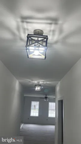 a view of a livingroom with windows