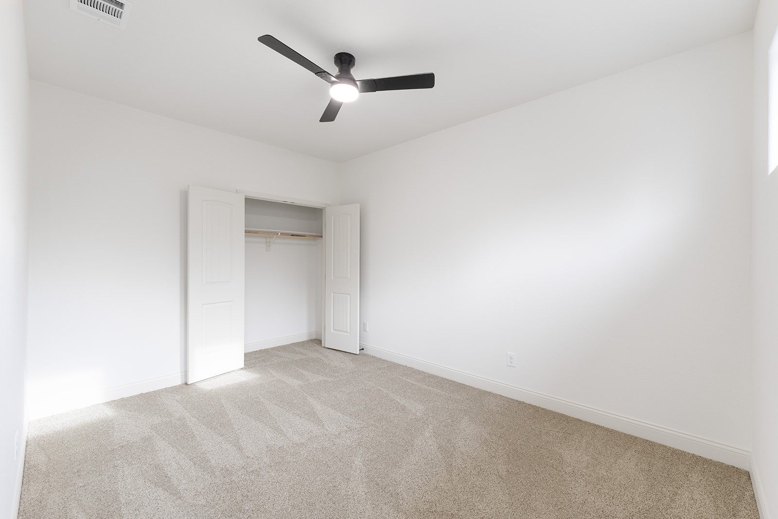 114 North Saddle Ridge Drive Cedar Park, TX 78613 - Photo 32 of 40 an empty room with a ceiling fan and window