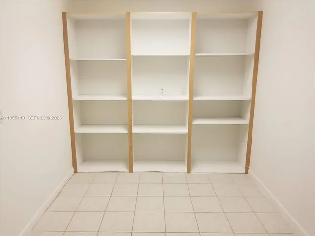 a view of an empty walk in closet
