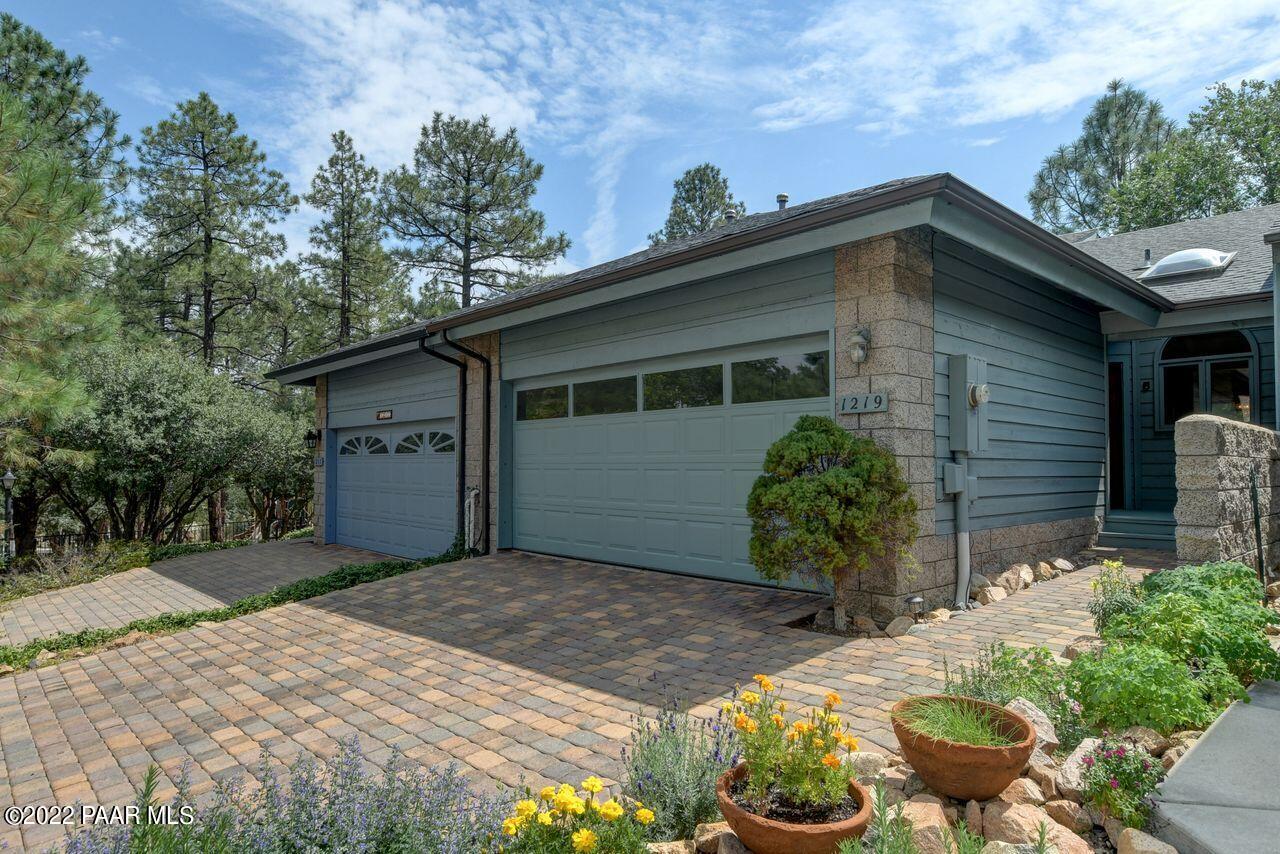 1219 Timber Point North Prescott, AZ 86303 - Photo 1 of 33 a front view of a house with garden