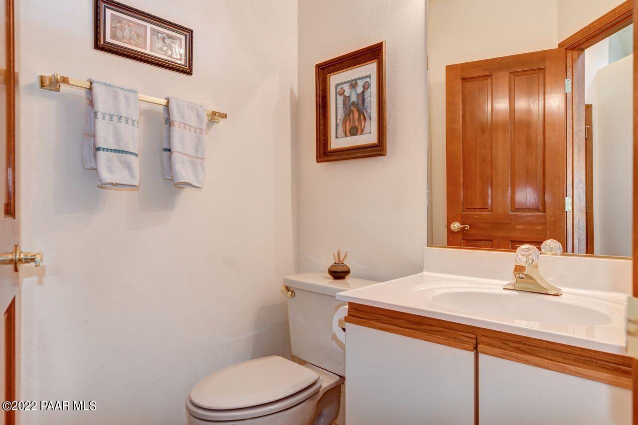 1219 Timber Point North Prescott, AZ 86303 - Photo 13 of 33 a bathroom with a sink toilet and vanity