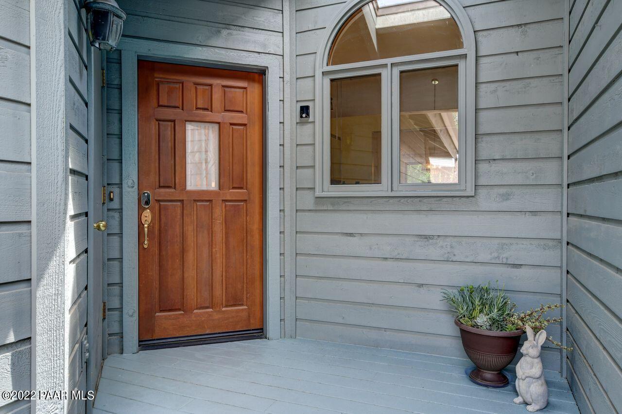 1219 Timber Point North Prescott, AZ 86303 - Photo 3 of 33 a view of front door of house and potted plant