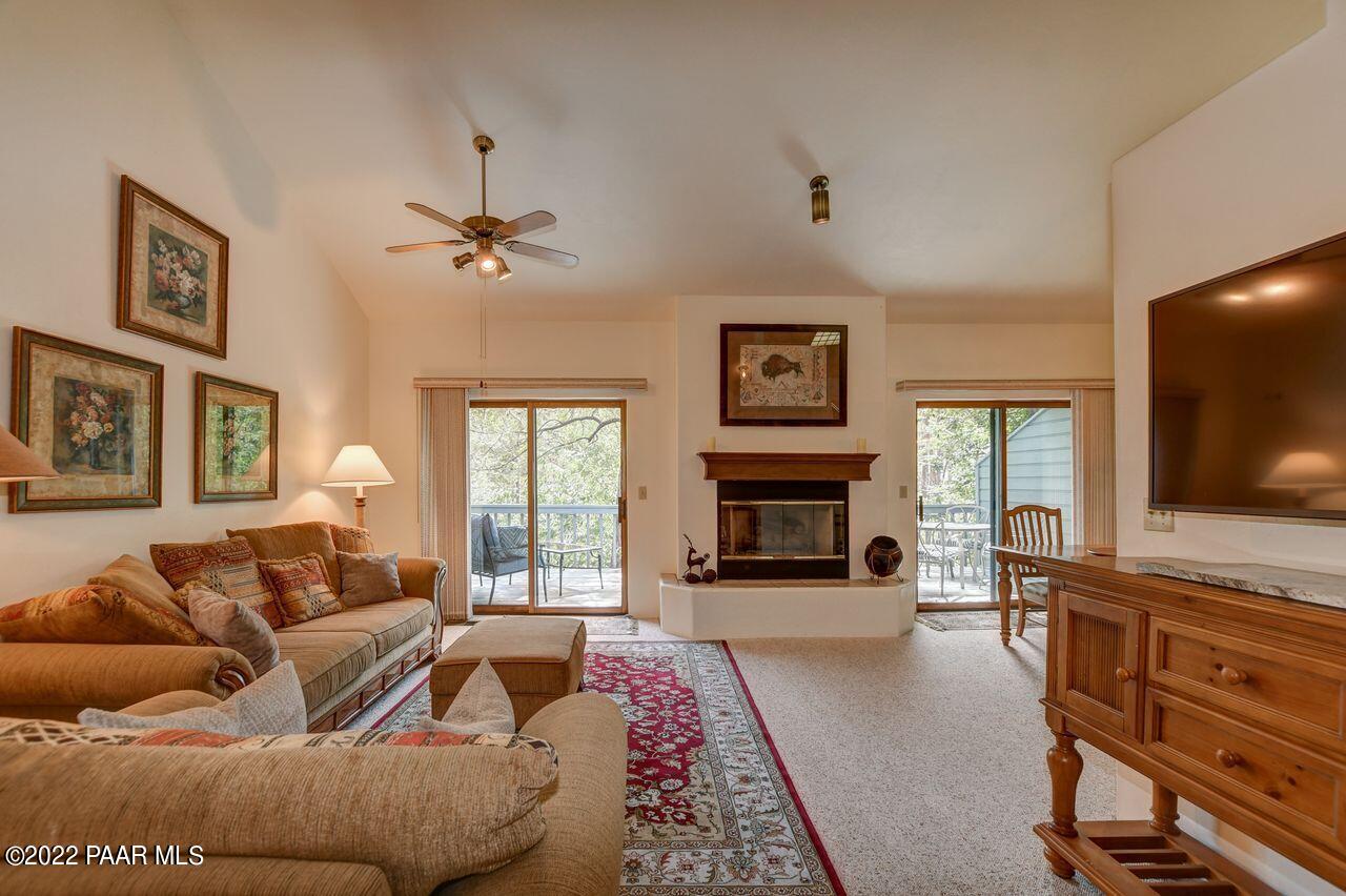 1219 Timber Point North Prescott, AZ 86303 - Photo 4 of 33 a living room with furniture fireplace and flat screen tv