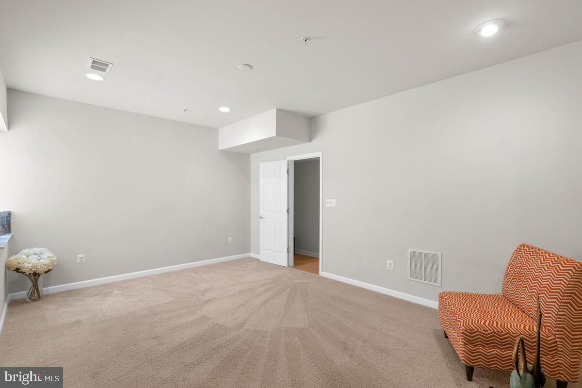 2145 Little Sorrel Way Silver Spring, MD 20902 - Photo 8 of 39 A second view of the rec room or 4th bed