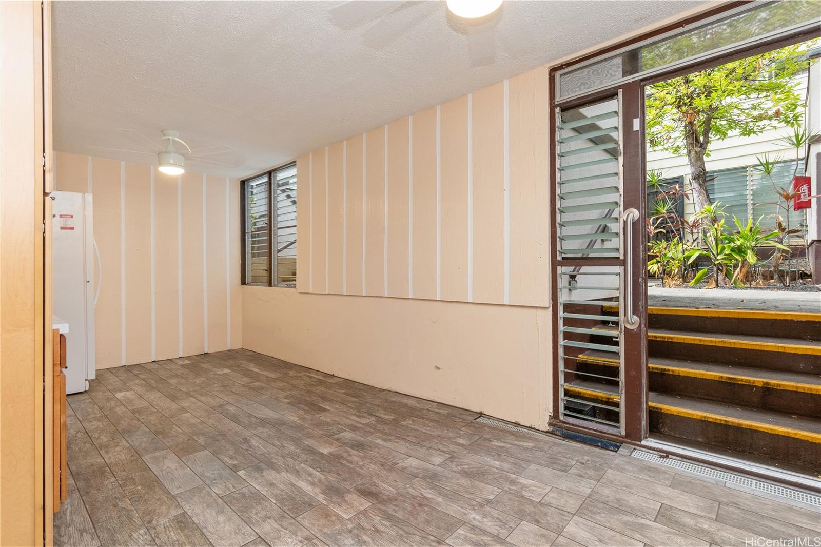 98-360 Koauka Loop, Unit 243 Aiea, HI 96701 - Photo 22 of 25 an empty room with windows