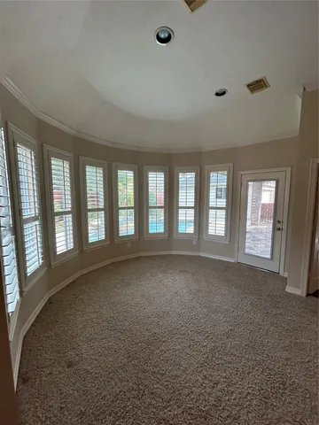 a view of a big room with closet and natural light