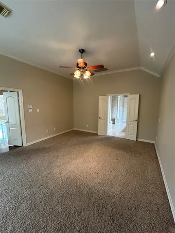 a view of a big room with carpet