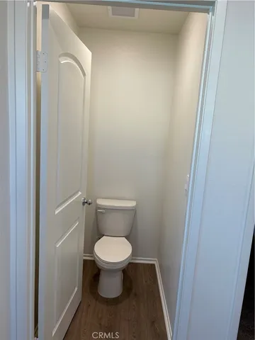 a bathroom with a toilet and a sink