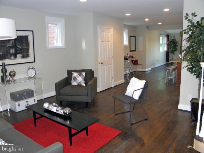 3960 S Street Southeast Washington, DC 20020 - Photo 2 of 27 a living room with furniture rug and window