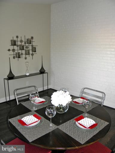 3960 S Street Southeast Washington, DC 20020 - Photo 24 of 27 a table with white and a living room