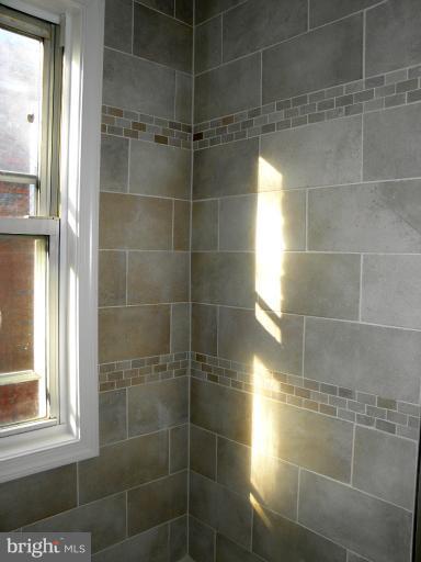 3960 S Street Southeast Washington, DC 20020 - Photo 26 of 27 a bathroom with a shower